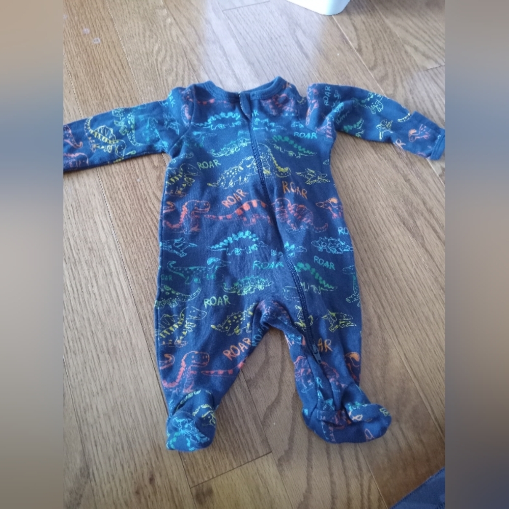 Blue baby boy dinosaur onesie